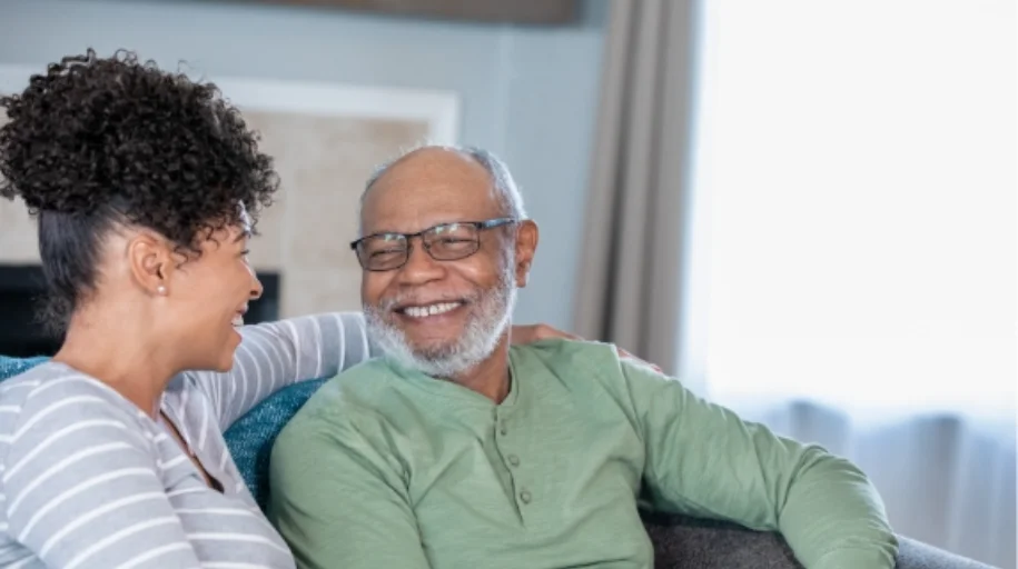 A old couple are similling by seeing each other