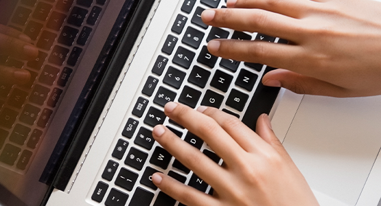 Typing on a laptop keyboard