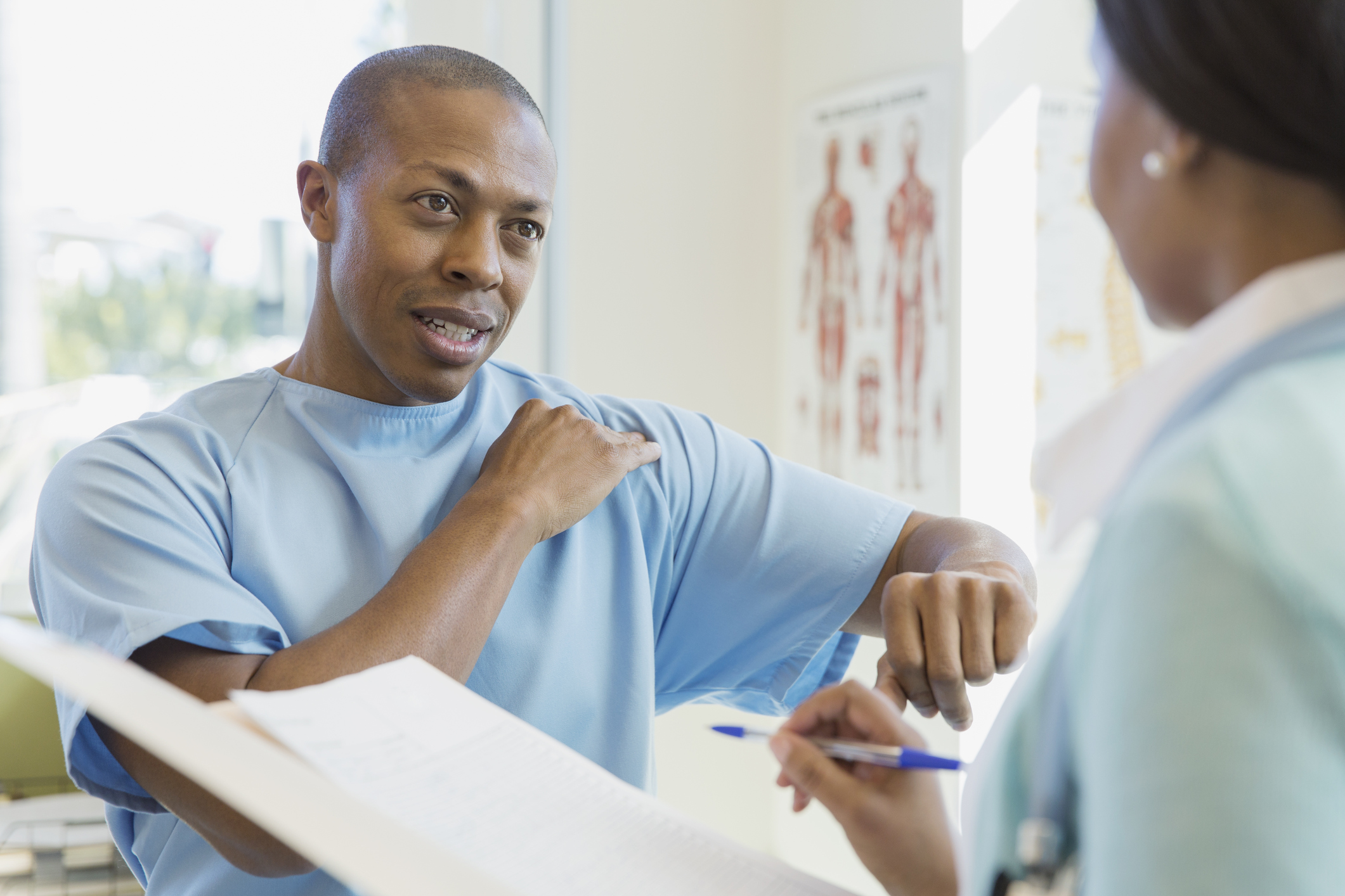 Patient trying to explain his health to nurse