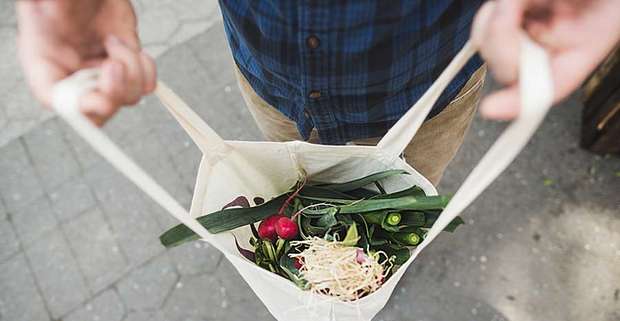 Farmers market food in a shopping bag