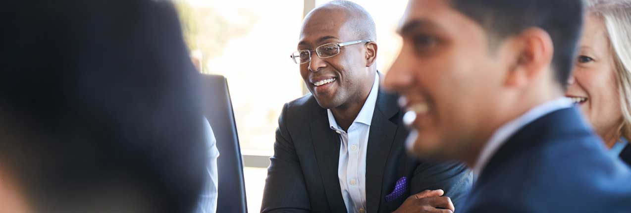 People collaborating at a workplace and sharing their views