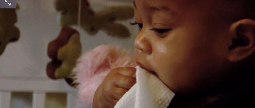 Baby with napkin