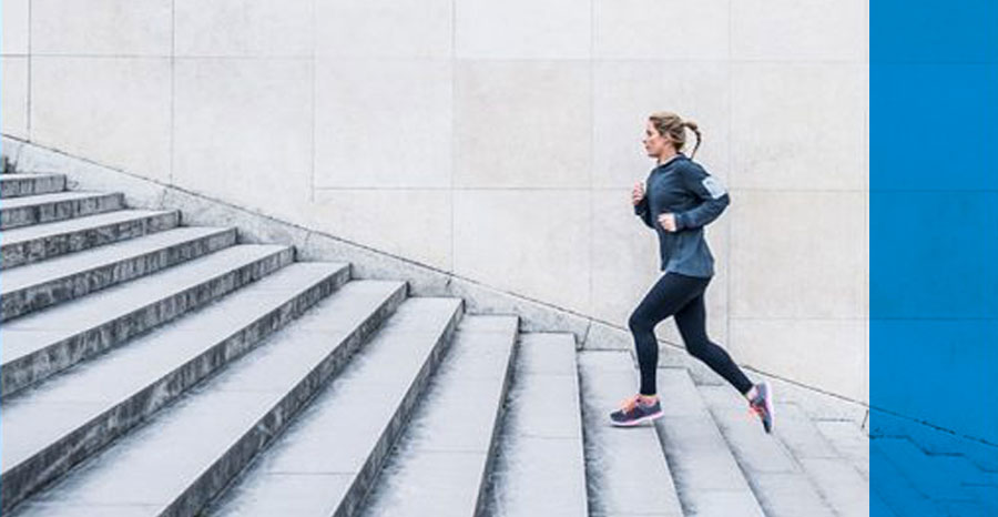 A runner sprinting up the stairs 