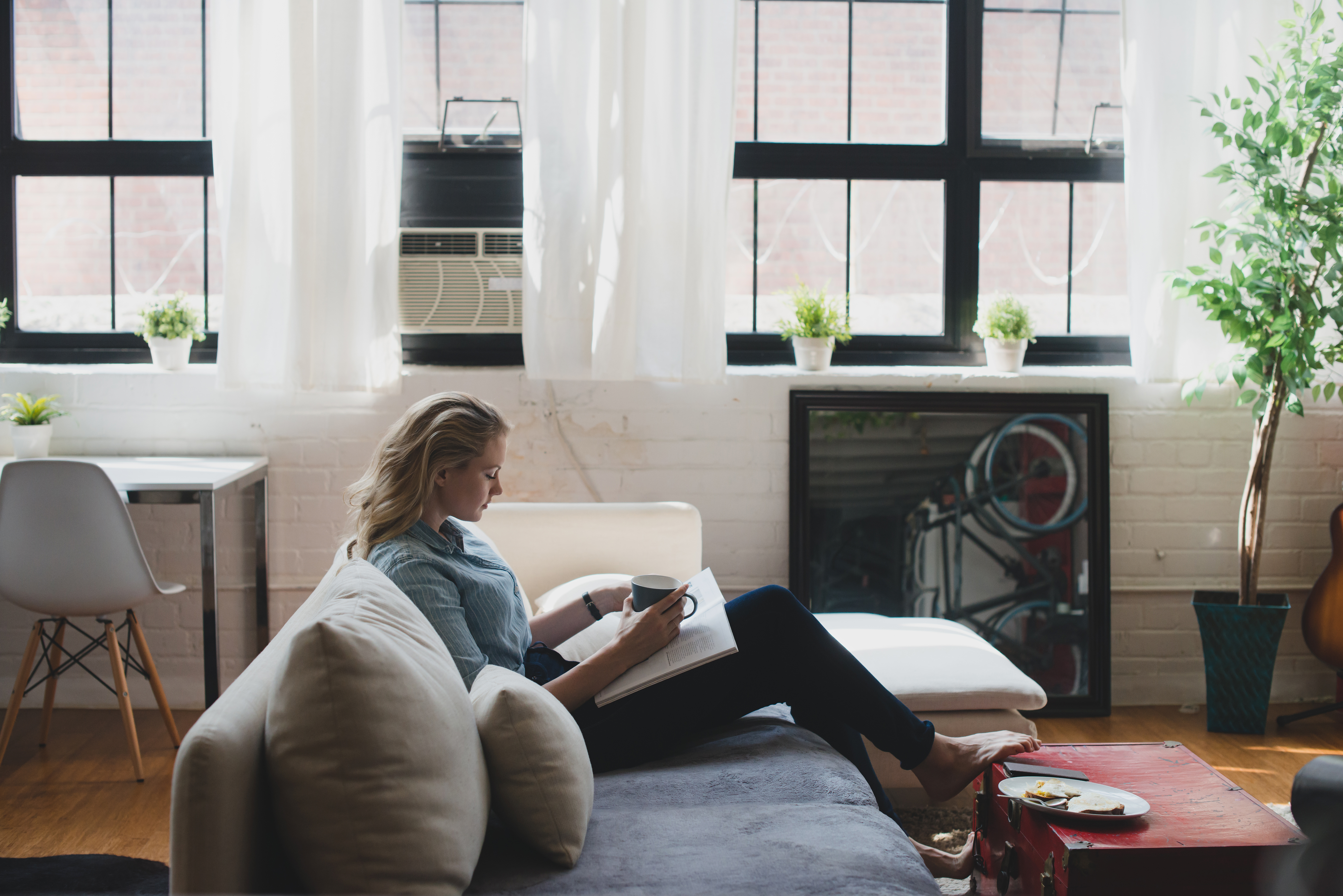 A girl relaxing at the Office Desk.