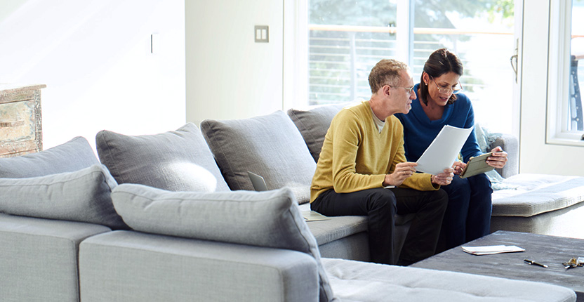 Elderly couple discussing on plans